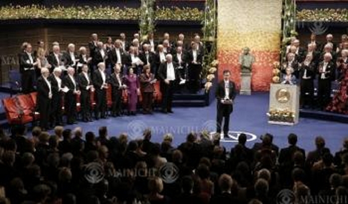 Nobel Prize 2015. Award ceremony in Stockholm Takaaki Kajita, director of the Institute for Cosmic Ray Research at the University of Tokyo, receives his physics medal and certificate at the Nobel Prize ceremony at the Concert Hall in Stockholm, December 10, 2015, 4:54 p.m.  representative photo 
