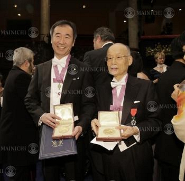 Nobel Prize 2015. Award ceremony in Stockholm Takaaki Kajita, Director of the Institute for Cosmic Ray Research at the University of Tokyo  left  and Satoshi Omura, Distinguished Professor of Kitasato University, hold their medals after the Nobel Prize ceremony at the Concert Hall in Stockholm, December 10, 2015, 5:48 p.m.  Representational photo 