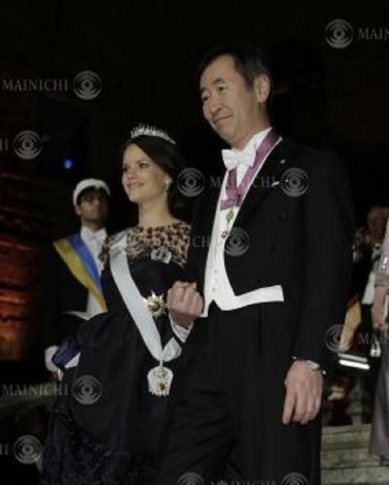 Nobel Prize 2015. Dinner in Stockholm Princess Sofia  left  and Takaaki Kajita, director of the Institute for Cosmic Ray Research at the University of Tokyo, attend a dinner after the Nobel Prize ceremony at Stockholm City Hall, December 10, 2015, 7:09 p.m.  Representative photo 