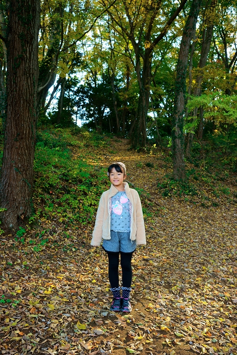 Girl and Autumn Forest