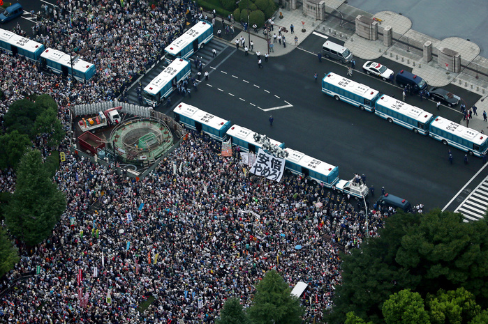 Demonstration against the Security Law Tens of thousands gathered in front of the Diet Large numbers of people surround the Diet at a rally against the security bills Large numbers of people gather in front of the main gate of the Diet  top right  in opposition to the security bills, photographed by Takeshi Morita from a Head Office helicopter at 2:21 p.m. on August 30, 2015, in Tokyo s Chiyoda Ward.