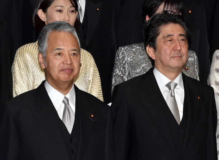 Representative Question from the House of Representatives Opposition parties to pursue Minister Amari  October 2015 photo of documents  October 7, 2015, Tokyo, Japan   Japan s Economy and Fiscal Minister Akira Amari, left, stands nex to Prime Minister Shinzo Abe during a photo Amari has been in hot water over a weekly magazine report that he and his aides allegedly accepted at least 12 million yen report that he and his aides allegedly accepted at least 12 million yen in cash from a construction company in exchange for Amari s office  s help in settling a dispute between the company and a housing development organization. Photo by Natsuki Sakai AFLO  AYF  mis 