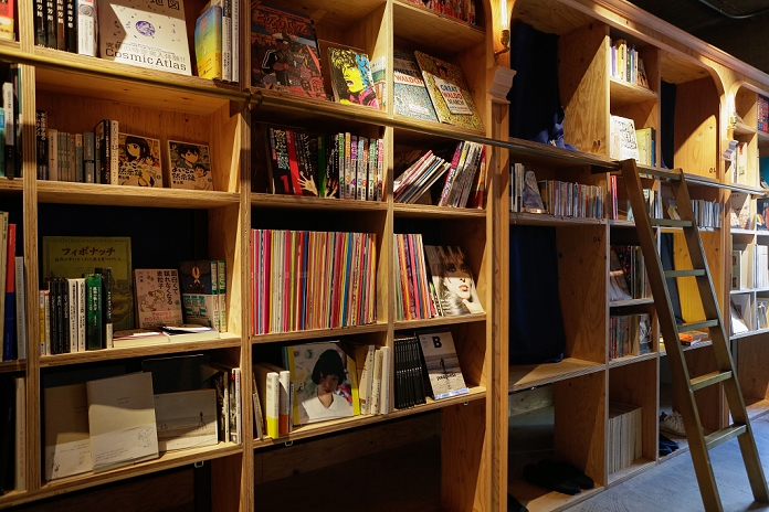 Into a dream while reading  Bookstore where you can stay overnight  in Ikebukuro The Book and Bed designer hostel in Ikebukuro on February 5, 2016 in Tokyo, Japan. This new Tokyo hostel was designed on the concept of staying overnight in a bookstore. It includes 30 bed compartments tucked into a wall of bookshelves and a communal reading space. Sleeping compartments cost from JPY 3,000   JPY 4,000 per night  approx. US  30 40  and the hostel managers want to promote the idea of dozing off comfortably whilst reading a book. The new hostel next to Ikebukuro JR rail station has an English homepage and could be a good solution for visiting backpackers.  Photo by Martin Hladik AFLO 