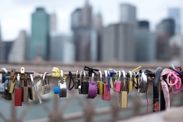 New York, U.S.A.  November 2015   Love locks  are seen in front of New York City skyscrapers on Brooklyn bridge in New York, November 13, 2015.  Photo by Yuriko Nakao AFLO 