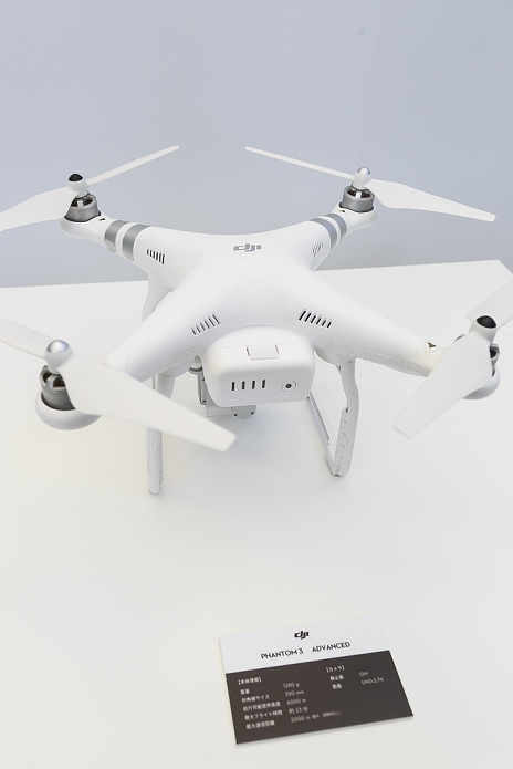 DJI unveils its newest drone. New features including obstacle avoidance The new generation Phantom 4 that can dodge obstacles and track objects on display during a media event in Roppongi Hills on March 3, 2016, Tokyo, Japan. DJI s new model integrates a set of stereo cameras and proximity sensors that work with a computer software vision, which allows the Phantom 4 to fly autonomously. The new generation drone includes two newly added features, the ActiveTrack to continuously record a moving object and TapFly that allows users to select waypoints by controlling their smartphone or tablet. The Phantom 4 includes an Obstacle Sensing System that allows avoiding obstacles and a smart battery that enables roughly 28 minutes of continuous flight while using the on board 4K camera. Priced at 189,000JPN or approximately 1,400USD, the Phantom 4 is available for pre order on its website and Apple.com. Apple retail stores will stock them starting March 15.  Photo by Rodrigo Reyes Marin AFLO 