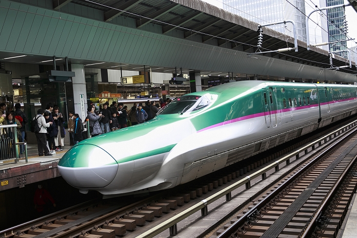 Hokkaido Shinkansen Line Opens Tokyo   Shin Hakodate Hokuto in 4 hours The Hayabusa Shinkansen  bullet train  leaves Tokyo Station on its first day of operation on March 26, 2016, Tokyo, Japan. The Hayabusa shinkansen connects Tokyo with the northern island of Hokkaido via the 53.85 km long Seikan Tunnel. Previously Japan s bullet train only operated as far as Aomori but the new rail link now goes to Shin Hakodate Hokuto Station in Hokkaido with a further extension planned to Sapporo by 2030. A one way ticket costs 22,690 yen  200 UDS  from Tokyo to Shin Hakodate Hokuto and the fastest trains will take 4 hours and 2 minutes for the journey.  Photo by Rodrigo Reyes Marin AFLO 