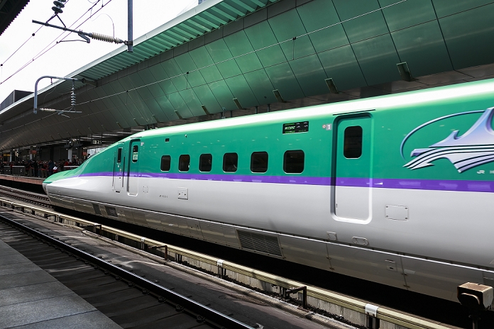 Hokkaido Shinkansen Line Opens Tokyo   Shin Hakodate Hokuto in 4 hours The Hayabusa Shinkansen  bullet train  arrives at Tokyo Station on its first day of operation on March 26, 2016, Tokyo, Japan. The Hayabusa shinkansen connects Tokyo with the northern island of Hokkaido via the 53.85 km long Seikan Tunnel. Previously Japan s bullet train only operated as far as Aomori but the new rail link now goes to Shin Hakodate Hokuto Station in Hokkaido with a further extension planned to Sapporo by 2030. A one way ticket costs 22,690 yen  200 UDS  from Tokyo to Shin Hakodate Hokuto and the fastest trains will take 4 hours and 2 minutes for the journey.  Photo by Rodrigo Reyes Marin AFLO 
