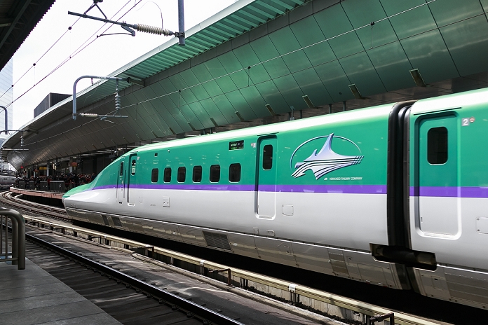 Hokkaido Shinkansen Line Opens Tokyo   Shin Hakodate Hokuto in 4 hours The Hayabusa Shinkansen  bullet train  arrives at Tokyo Station on its first day of operation on March 26, 2016, Tokyo, Japan. The Hayabusa shinkansen connects Tokyo with the northern island of Hokkaido via the 53.85 km long Seikan Tunnel. Previously Japan s bullet train only operated as far as Aomori but the new rail link now goes to Shin Hakodate Hokuto Station in Hokkaido with a further extension planned to Sapporo by 2030. A one way ticket costs 22,690 yen  200 UDS  from Tokyo to Shin Hakodate Hokuto and the fastest trains will take 4 hours and 2 minutes for the journey.  Photo by Rodrigo Reyes Marin AFLO 
