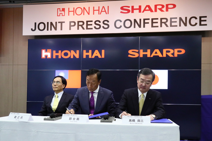 Hon Hai Signs Acquisition Agreement with Sharp Signing Ceremony in Sakai, Osaka Terry Gou, Founder and Chairman of Taiwanese electronics contractor Foxconn  official name Hon Hai Precision Industry Co., Ltd. , and Kozo Takahashi, President and CEO of Sharp Corporation, speak at a joint press conference held at Sakai Display Products Corporation on April 2, 2016 in Sakai Ward, Osaka, Japan. Gou and Takahashi announced the final terms for the final terms for the Sharp Corporation, which will be announced at a joint press conference held at Sakai Display Products Corporation on April 2, 2016 in Sakai Ward, Osaka, Japan. Gou and Takahashi announced the final terms for the deal for the Foxconn to acquire Japan s Sharp at discounted rate on after a month of uncertainty. Originally Foxconn had offered  4.4 billion for a two thirds stake in Sharp, but ended up paying  3.5 billion after undisclosed Sharp liabilities became apparent. Foxconn is expected to use its controlling stake in Sharp to strengthen its negotiating position with it s biggest customer, Apple Inc., now that it has access to the Japanese company s superior screen display technology.