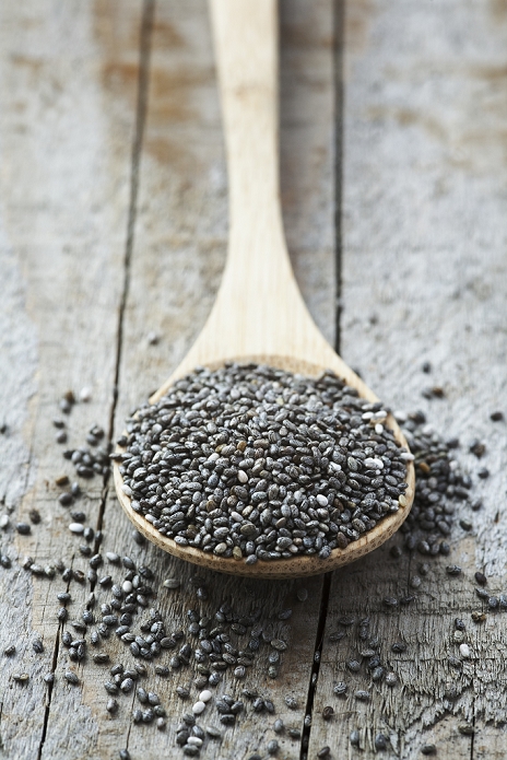 Black Chia seeds. Pile of seeds from the chia (Salvia hispanica) plant. Chia is grown commercially for its edible seeds, which are rich in omega-3 fatty acids and are traditionally eaten in Mexico, and the southwestern United States.