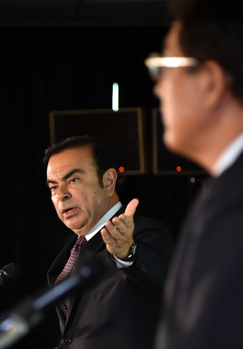 Mitsubishi Motors to become part of Nissan Top executives of both companies hold joint press conference May 12, 2016, Yokohama, Japan   Chairman Carlos Ghosn of Nissan Motor speaks during an impromptu news conference at Nissan s head office in Listening by his side is Chairman Osamu Masuko of Mitsubishi Motors. Ghosn announced that Nissan will pay 2.17 billion dollars for a 34  stake in the scandal hit Mitsubishi, making Nissan the single largest shareholder.  Photo by Natsuki Sakai AFLO  AYF  mis 