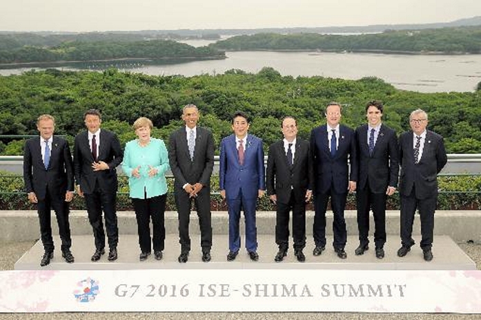 G7 Summit leaders pose for a commemorative photo with Ago Bay in the background.  From left  EU Summit Permanent President Tusk, Italian Prime Minister Renzi, German Chancellor Merkel, US President Obama, Japanese Prime Minister Shinzo Abe, French President Hollande, British Prime Minister David Cameron, Canadian Prime Minister Trudeau, and European Commission President Juncker pose for a commemorative photo of the Ise Shima Summit with Ago Bay in the background. At the Shima Kanko Hotel in Shima, Mie Prefecture, Japan  photo by Asahi Shimbun representative, May 26, 2016.