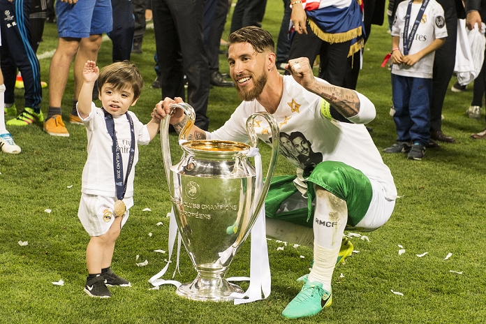 UEFA Champions League Final Real wins 11th title in two years Sergio Ramos  Real , MAY 28, 2016   Football   Soccer : Sergio Ramos of Real Madrid celebrates with the trophy and son Sergio Jr. after winning the penalty shoot out during the UEFA Champions League final match between Real Madrid 1 5 3 1 Atletico de Madrid at Stadio Giuseppe Meazza San Siro in Milan, Italy.  Photo by Enrico Calderoni AFLO SPORT 