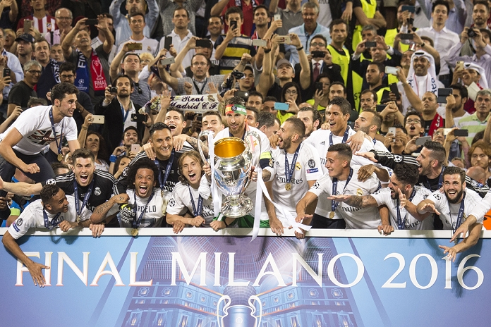 UEFA Champions League Final Real wins 11th title in two years Real Madrid team group, MAY 28, 2016   Football   Soccer : Sergio Ramos of Real Madrid holds up the trophy after winning the penalty shoot out during the UEFA Champions League final match between Real Madrid 1 5 3 1 Atletico de Madrid at Stadio Giuseppe Meazza San Siro in Milan, Italy.  Photo by Enrico Calderoni AFLO SPORT 