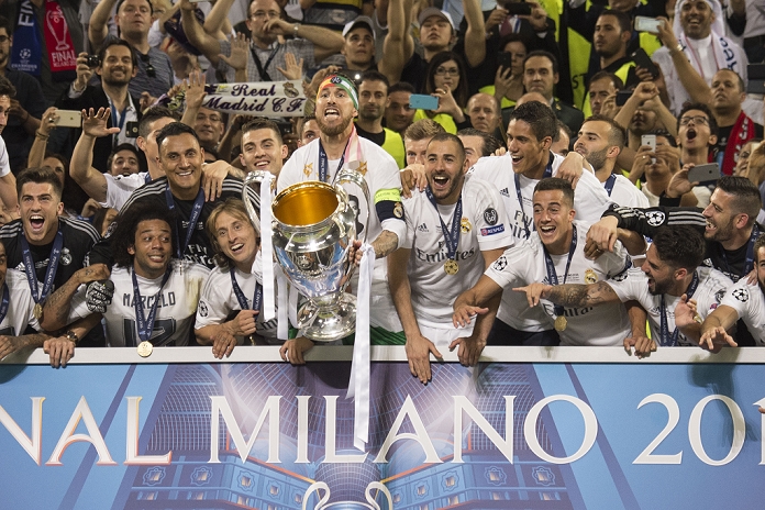 UEFA Champions League Final Real wins 11th title in two years Real Madrid team group, MAY 28, 2016   Football   Soccer : Sergio Ramos of Real Madrid holds up the trophy after winning the penalty shoot out during the UEFA Champions League final match between Real Madrid 1 5 3 1 Atletico de Madrid at Stadio Giuseppe Meazza San Siro in Milan, Italy.  Photo by Enrico Calderoni AFLO SPORT 
