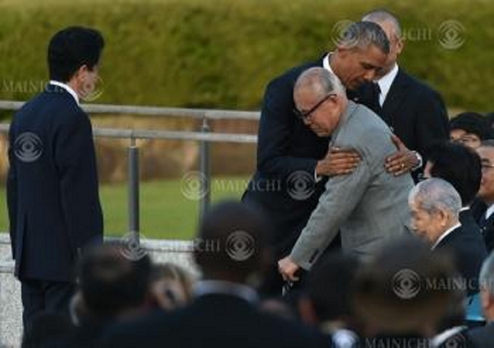 President Obama Visits Hiroshima First sitting President to visit Hiroshima U.S. President Barack Obama embraces Mr. Shigeaki Morishige, who is conducting a survey of U.S. POW A bomb survivors, after delivering his remarks. In front of Mr. Morishige is Sunao Tsuboi, representative member of the Japan Confederation of A  and H Bomb Sufferers Organizations, and to his left is Prime Minister Shinzo Abe.