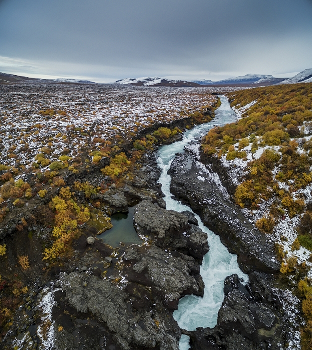 Iceland Aerial of autumn color by Hraunfossar waterfalls, Iceland.  This image is shot using a drone. Photo by Ragnar Th Sigurdsson
