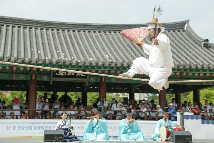 Important Intangible Cultural Asset  Tightrope Walking Performed at a festival in Seoul, Korea Dano Festival, June 9, 2016 : Kim Dae gyun, tightrope walking master and the Important Intangible Cultural Property No. 58 of South Korea, performs during  Early Summer High Day, Dano Festival  at the Namsangol Hanok Village in Seoul, South Korea.  Photo by Lee Jae Won AFLO   SOUTH KOREA 