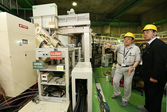 Proposed name of element 113 Niphonium  was chosen as the name of the element 113. Kosuke Morita, group director of the Superheavy Elements Research Group at the RIKEN Nishina Center for Accelerator Based Science, explains GARIS  gas filled recoil separator  to MEXT Minister Hiroshi Hase  right  on June 9, 2016 at RIKEN in Wako, Saitama Prefecture  representative photo .