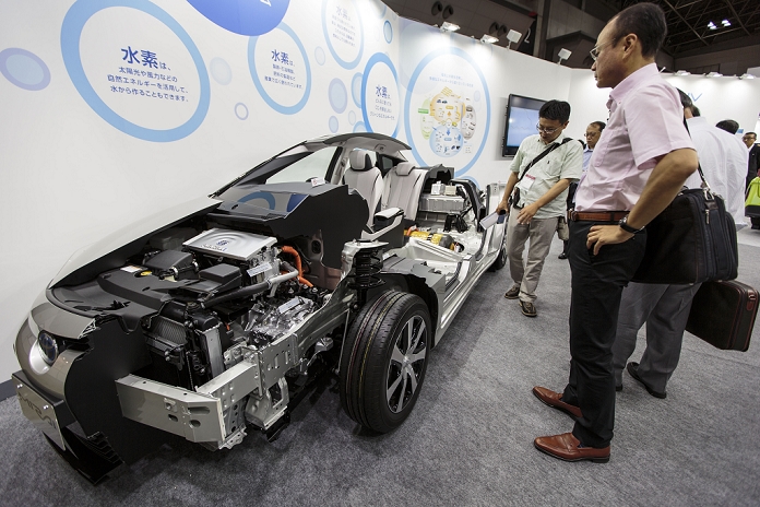 Smart Community 2016 Introducing next generation technologies and infrastructure Tokyo, Japan, June 17, 2016   Visitors look at the fuel cell system of a Toyota Mirai vehicle at the Toyota Motor Corp. booth during the Smart Community Japan 2016 in Tokyo on Friday, June 17, 2016. The Smart Community Japan expo showcases the latest technology related to new generation energy, reforms in the energy market, biomass, plant factory and smart agriculture and renewable energy.  Photo by AFLO 
