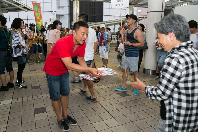 2016 Upper House Election: Life Party Street speeches in Tokyo Japanese politician and former actor Taro Yamamoto distributes propaganda during a campaign event of the independent candidate Yohei Miyake in Tachikawa on July 4, 2016, Tokyo, Japan. Yamamoto and Ichiro Ozawa president of People s Life Party came to support Miyake s election campaign as an independent candidate for the House of Councillors elections.  Photo by Rodrigo Reyes Marin AFLO 