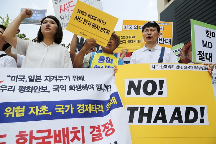 THAAD interceptor missile. Protest against the decision to deploy in South Korea Protest against the THAAD system in South Korea, Jul 11, 2016 : South Koreans stage a protest against the decision to deploy the THAAD system in their country, near the U.S. embassy in Seoul, South Korea. According to local media, South Korea and the U.S. announced last Friday that they had agreed to deploy the Terminal High Altitude Area Defense  THAAD  system in the South. China and Russia argued THAAD would hurt their security interests. North Korea warned on July 11, 2016 that it will take  physical  actions against the South and the U.S. from the moment the two countries decide on where to deploy the THAAD system in the South, local media reported.  Photo by Lee Jae  Won AFLO   SOUTH KOREA 