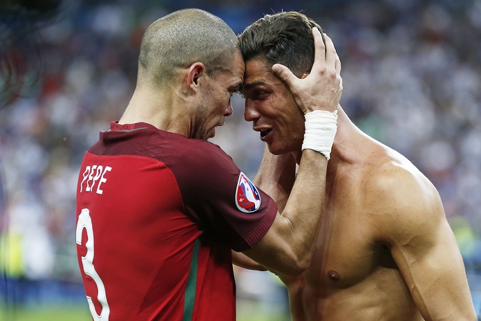 Euro 2016 Final. Portugal wins for the first time  L R  Pepe, Cristiano Ronaldo  POR , JULY 10, 2016   Football   Soccer : Ronaldo and Pepe celebrate after winning UEFA EURO 2016 final match between Portugal 1 0 France at the Stade de France in Saint Denis, France.  Photo by Mutsu Kawamori AFLO   3604 