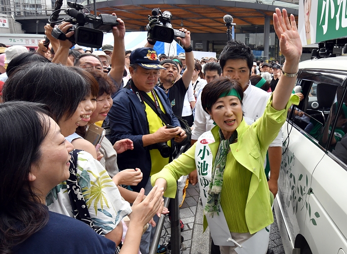 Tokyo Gubernatorial Election 2016 Koike gives a town hall speech in Tokyo July 17, 2016, Tokyo, Japan   Former Defense Minister Yuriko Koike campaigns for the July 31 Tokyo gubernatorial election at  Yurakucho railroad station, the gateway to the bustling shopping district of Ginza, on Sunday, July 17, 2016. Contenders took to the streets on the first Sunday since campaigning officially started Thursday, appealing voters for their support in the race to fill the vacancy left by the resignation of disgraced former Gov. Yoichi Masuzoe.  Photo by Natsuki Sakai AFLO  AYF  mis 