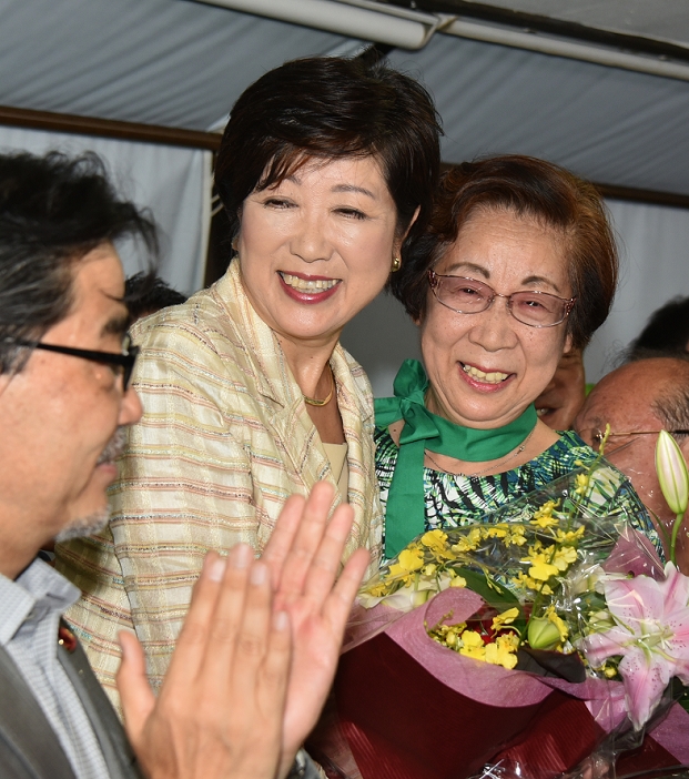 Tokyo Gubernatorial Election 2016 Koike becomes first female governor of Tokyo July 31, 2016, Tokyo, Japan   Japan s former Defense Minister Yuriko Koike, center, beams a big smile as she celebrates her landslide victory in the gubernatorial election with her jubilant supporters at the election headquarters in her own precinct in Tokyo s Ikebukuro Koike, a 64 year old former newscaster turned politician, becomes the first female governor of the nation s capital, defeating two major candidates who were supported by the ruling bloc and a coalition of four opposition parties. AYF mis 