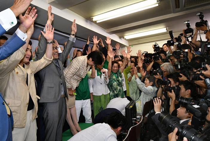 Tokyo Gubernatorial Election 2016 Koike becomes first female governor of Tokyo July 31, 2016, Tokyo, Japan   Japan s former Defense Minister Yuriko Koike, center, takes a deep bow as her supporters celebrate her landslide victory in the gubernatorial election with Banzai cheers at her election headquarters in her own precinct in Tokyo s Ikebukuro Koike, a 64 year old former newscaster turned politician, becomes the first female governor of the nation s capital, defeating two major candidates who were supported by the ruling bloc and a coalition of four opposition parties. AYF mis 
