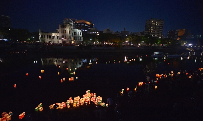 71st anniversary of the atomic bombing of Hiroshima Lantern floating ceremony to pray for peace August 6, 2016, Hiroshima, Japan : People float colorful paper lanterns into the Motoyasu River in front of the Atomic Bomb Dome marking the 71th anniversary of the atomic bombing in Hiroshima, Japan, on August 6, 2016.  Photo by AFLO 