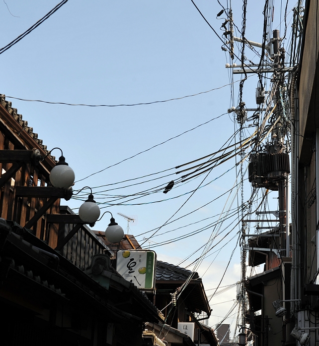 Electric Lines Damaging the Landscape Pontocho, Kyoto  June 10, 2016  June 10, 2016, Kyoto, Japan   Lined with traditional shops and eateries, Pontocho Alley, which is considered by many Kyoto residents and visitors to be the most beautiful street in Kyoto, western Japan, is marred by messy overhead utility cables on June 10, 2016. The City of Kyoto indeed has plans to burry these lines underground but when will that happen, nobody knows.  Photo by Osamu Honda AFLO 