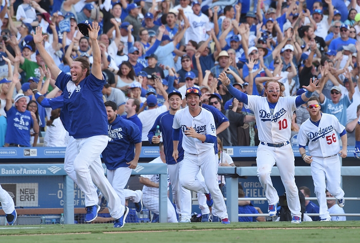 2016 MLB Dodgers Win District Championship  L R  Clayton Kershaw, Kenta Maeda, Justin Turner, J. P. Howell  Dodgers , SEPTEMBER 25, 2016   MLB : Kenta Maeda of the Los Angeles Dodgers celebrates their fourth straight National League West title with his teammates after Charlie Culberson  not pictured  hit a walk off home run in the Kenta Maeda of the Los Angeles Dodgers celebrates their fourth straight National League West title with his teammates after Charlie Culberson  not pictured  hit a walk off home run in the tenth inning to win the Major League Baseball game against the Colorado Rockies at Dodger Stadium in Los Angeles, California, United States. AFLO 