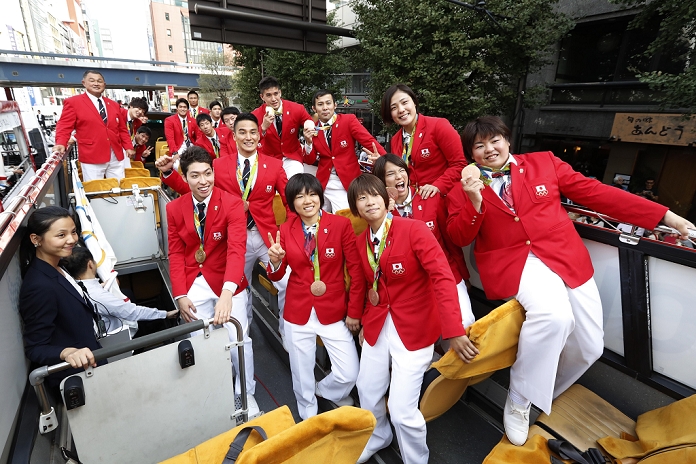 Rio Olympics and Paralympics Japan Medalists Joint Parade Japan Delegation  JPN , OCTOBER 7, 2016 : Japanese medalists of the Rio 2016 Olympic and Paralympic Games wave to spectators during a parade from Ginza to Nihonbashi, Tokyo, Japan.  Photo by AFLO SPORT 
