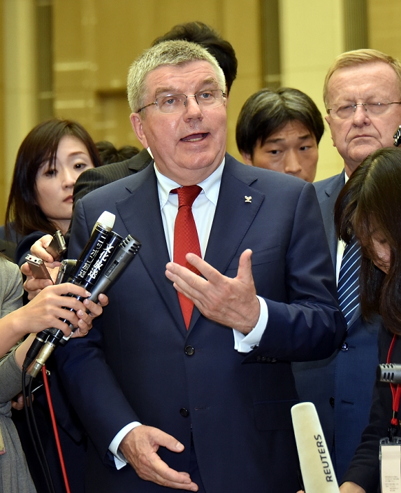 Governor Koike Meets with IOC President Exchanged views on venue review October 18, 2016, Tokyo, Japan   Thomas Bach, center, International Olympic Committee president, answers questions from the media following his meeting with Gov. Yuriko Koike during their meeting at the City Hall in Tokyo on Tuesday, October 18, 2016. The IOC chief and the governor discussed a proposed move of the rowing and canoe events out of Tokyo as part of her attempt to cut back on spending for the 2020 Tokyo Olympics.   Photo by Natsuki Sakai AFLO  AYF  mis 