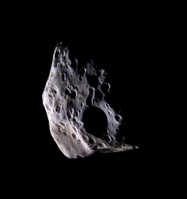 Epimetheus Epimetheus. Cassini spacecraft image of the Epimetheus, one of Saturn s moons. This small irregular shaped moon measures 116 kilometres across. The crater at lower centre is Hilairea, which has a diameter of roughly 33 kilometres. The orange feature at lower left is the crater Pollux. The Cassini Huygens spacecraft was launched in 1997 to investigate Saturn, its rings and its moons. This image was taken at a distance of 74,600 kilometres on 30 March 2005.