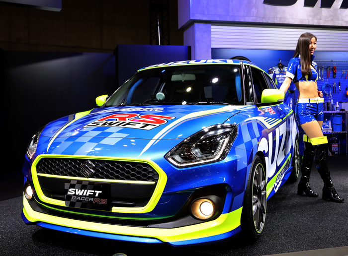 Tokyo Auto Salon 2017 Festival of custom cars January 13, 2017, Chiba, Japan   A model displays Suzuki Motor s Swift Racer RS at the Tokyo Auto Salon 2017 in Chiba, suburban Tokyo on Friday, January 13, 2017. More than 400 automakers and auto parts makers exhibit their latest products at a three day custom cars and racing cars exhibition.    Photo by Yoshio Tsunoda AFLO  LWX  ytd 