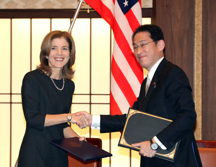 Scope of U.S. Military Personnel in Japan Reduced U.S. and Japan Sign Supplemental Agreement January 16, 2017, Tokyo, Japan   Japanese Foreign Minister Fumio Kishida  R  and U.S. ambassador to Japan Caroline Kennedy exchange documents on their agreement to remove legal protection over U.S. military base workers at the Iikura guesthouse in Tokyo on Monday, January 16, 2017. A U.S. base contractor killed a woman in Okinawa last year.    Photo by Yoshio Tsunoda AFLO  LWX  ytd 