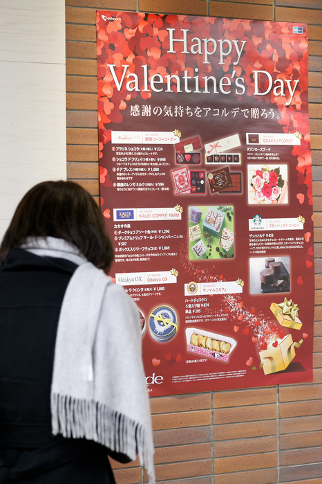 Valentine s Day sales peak Stores throughout Japan bustling with activity A woman looks at a Valentine s Day advertisement on display outside a department store on February 13, 2017, Tokyo, Japan. Valentine s Day is big business in Japan but a little different from other countries as women traditionally buy or make chocolates as Valentine s Day gifts for male friends and colleagues, and in return men are expected to give gifts to women a month later on White Day on March 14th.  Photo by Rodrigo Reyes Marin AFLO 