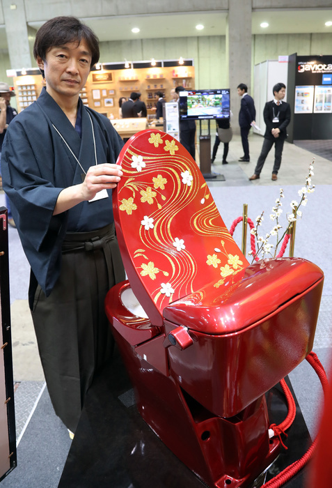 The price is over 10 million yen  Luxury toilet bowl with luxurious decoration February 23, 2017, Tokyo, Japan   Japan s toilet  wholesaler Sakamoto unveils a gorgeous toilet  Bidocoro  with a price of 10 million yen  90,000 US dollars  decorated with Japanese traditional lacquerware art with gold dusts and studded with diamonds and swarovski crystals at the annual Hotel and Restaurant Show in Tokyo on Thursday, February 23, 2017.    Photo by Yoshio Tsunoda AFLO  LwX  ytd 