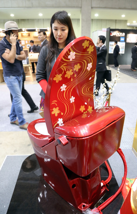 The price is over 10 million yen  Luxury toilet bowl with gorgeous decoration February 23, 2017, Tokyo, Japan   Japan s toilet  wholesaler Sakamoto unveils a gorgeous toilet  Bidocoro  with a price of 10 million yen  90,000 US dollars  decorated with Japanese traditional lacquerware art with gold dusts and studded with diamonds and swarovski crystals at the annual Hotel and Restaurant Show in Tokyo on Thursday, February 23, 2017.    Photo by Yoshio Tsunoda AFLO  LwX  ytd 