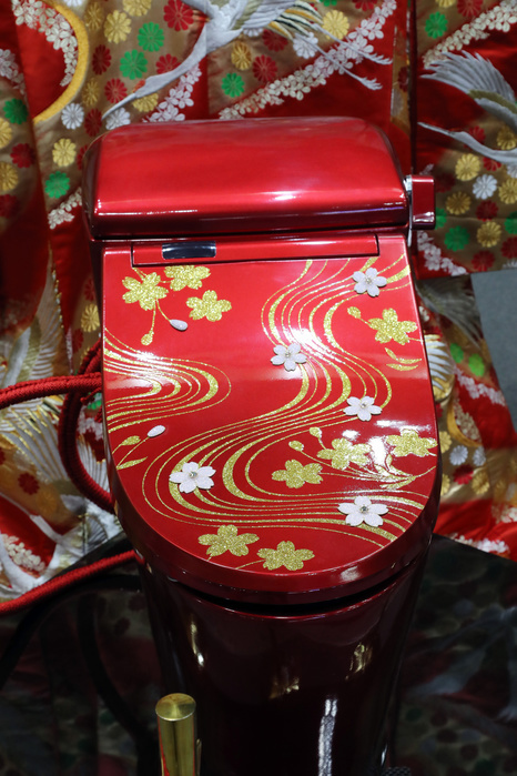 The price is over 10 million yen  Luxury toilet bowl with luxurious decoration February 23, 2017, Tokyo, Japan   Japan s toilet  wholesaler Sakamoto unveils a gorgeous toilet  Bidocoro  with a price of 10 million yen  90,000 US dollars  decorated with Japanese traditional lacquerware art with gold dusts and studded with diamonds and swarovski crystals at the annual Hotel and Restaurant Show in Tokyo on Thursday, February 23, 2017.    Photo by Yoshio Tsunoda AFLO  LwX  ytd 