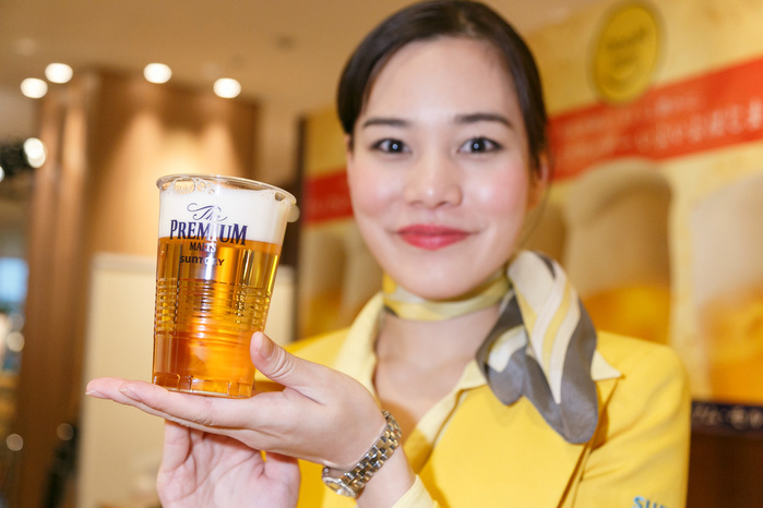 Premium Friday. Measures to Stimulate Consumption Started A bartender holds a Suntory beer during a special event for Premium Friday at Mitsukoshi department store in Ginza on February 24, 2017, Tokyo, Japan. Suntory Holdings and Ginza Mitsukoshi department store are supporting the Japan s Ministry of Economy, Trade and Industry  METI  campaign called Premium Friday which aims to change working style in Japan. In a country where excessive overtime and deaths from overwork  karoshi  are in the news, Premium Friday aims to encourage companies to let workers finish early every last Friday of each month to give them the opportunity to spend money after work or spend more time with their families.  Photo by Rodrigo Reyes Marin AFLO 