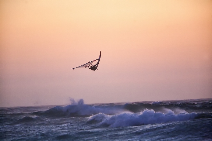 windsurfing Windsurfing off Guincho beach near Cascais, Portugal