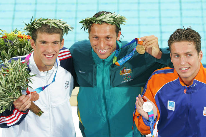 2004 Athens Olympics  L to R  Michael Phelps  USA , Ian Thorpe  AUS , Michael Phelps  USA , Pieter Van Den Hoogenband  NED ,  16 August 2004   Swimming : Australian swimmer and Gold medalist Ian Thorpe  AUS  poses with Silver Medalist Pieter Van Den Hoogenband  NED  and Bronze Medalist Michael Phelps  USA  after the Final of the Men s 200m Freestyle. Olympic Games, Athens, Greece.    Photo by AFLO SPORT   1045 