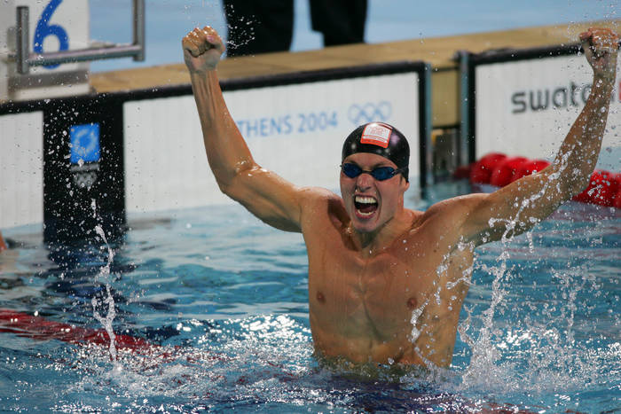 2004 Athens Olympics Pieter van den Hoogenband  NED ,  AUGUST 18, 2004   Swimming : Pieter van den Hoogenband of Netherlands celebrates winning gold in the mens swimming 100 metre freestyle final on August 18, 2004 during the Athens 2004 Summer Olympic Games at the Main Pool of the Olympic Sports Complex Aquatic Centre in Athens, Greece.    Photo by AFLO SPORT   1045 