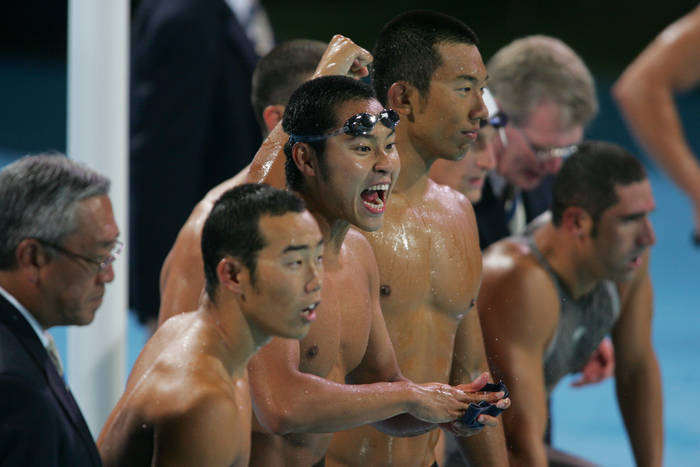 2004 Athens Olympics, Swimming, Men s 400m Medley Relay Final, Japan wins Bronze Medal Japan team, AUGUST 21, 2004   Swimming : Tomomi Morita, Kosuke Kitajima, Takashi Yamamoto of Japan relay team celebrates after the Men 4 x 100m Medley Relay Finals in the Athens 2004 Summer Olympic Games at the Main Pool of the Olympic Sports Complex Aquatic Centre in Athens, Greece.   Photo by AFLO SPORT   1045 