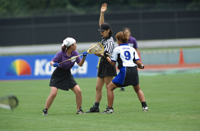 Tomomi Masuko (WISTERIA), Yoshimi Murakami (JPN)
JUNE 17, 2001 - Lacrosse : Tomomi Masuko (L) of WISTERIA and Yoshimi Murakami (R) of Japan in action during the Women's Lacrosse match between Japan (Photo by AFLO SPORT) (Photo by AFLO SPORT)
 (Photo by AFLO SPORT) [1045].