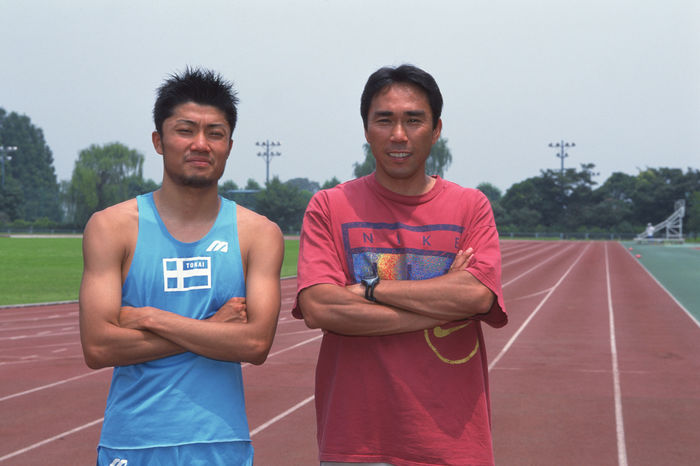 Shingo Suetsugu, Susumu Takano
JULY 5, 2000 - Athletics : Shingo Suetsugu (L) and his coach Susumu Takano (R) during a training session at Tokai University Ground in Japan.
(Photo by Ryuichi Kawakubo/AFLO SPORT) [1013].