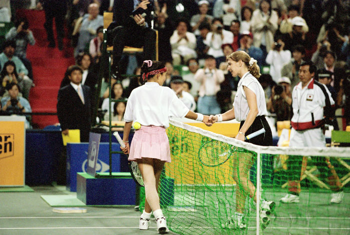 Date defeats Graf 1996 Fed Cup Japan vs Germany Legendary Match: Date vs Graf Kimiko Date  JPN , Steffi Graf  GER  APRIL 28, 1996   Tennis : Kimiko Date  L  of Japan shakes hands with Steffi Graf of Germany after Date defeated Graf during the KB Fed Cup match between Japan Date defeated Graf during the KB Fed Cup match between Japan and Germany at Ariake Colosseum in Tokyo, Japan.  Photo by AFLO   0772 .